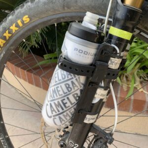 Water bottle cage store on front fork