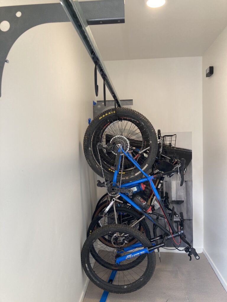 Installation of sliding bike rack in closet